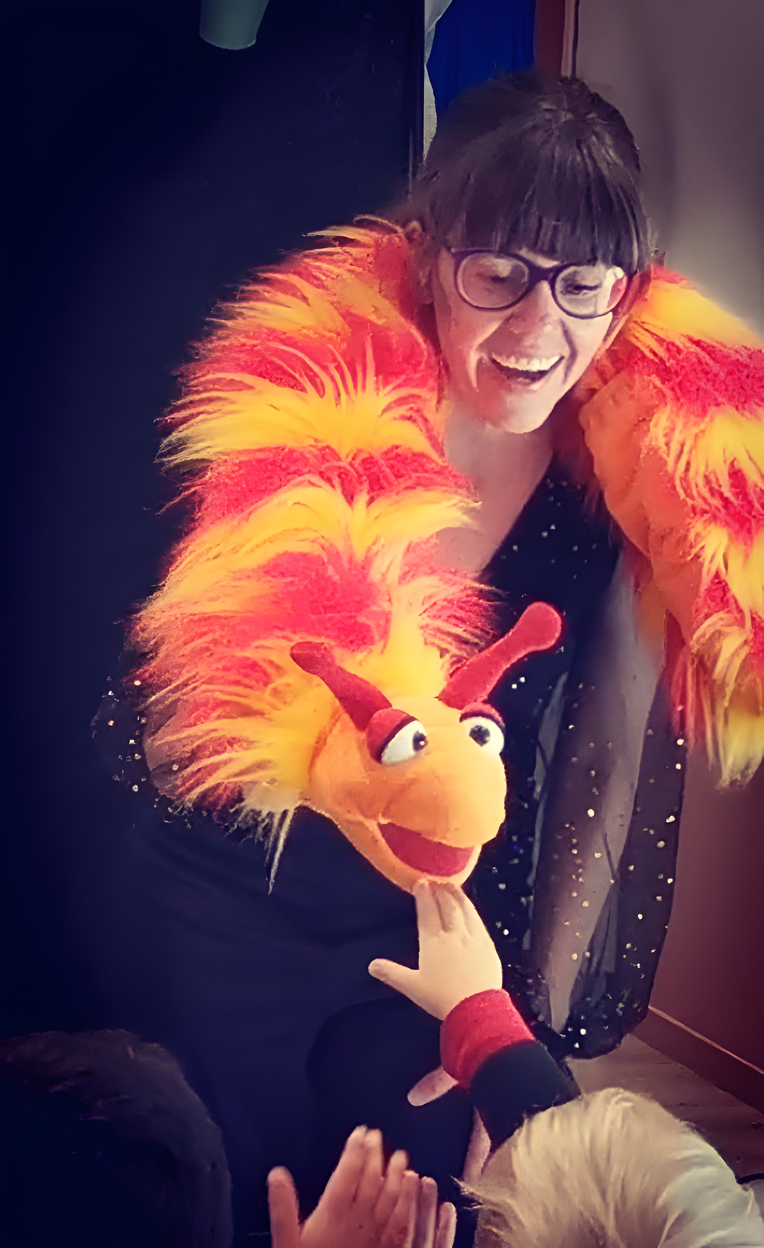Aga with a caterpillar puppet