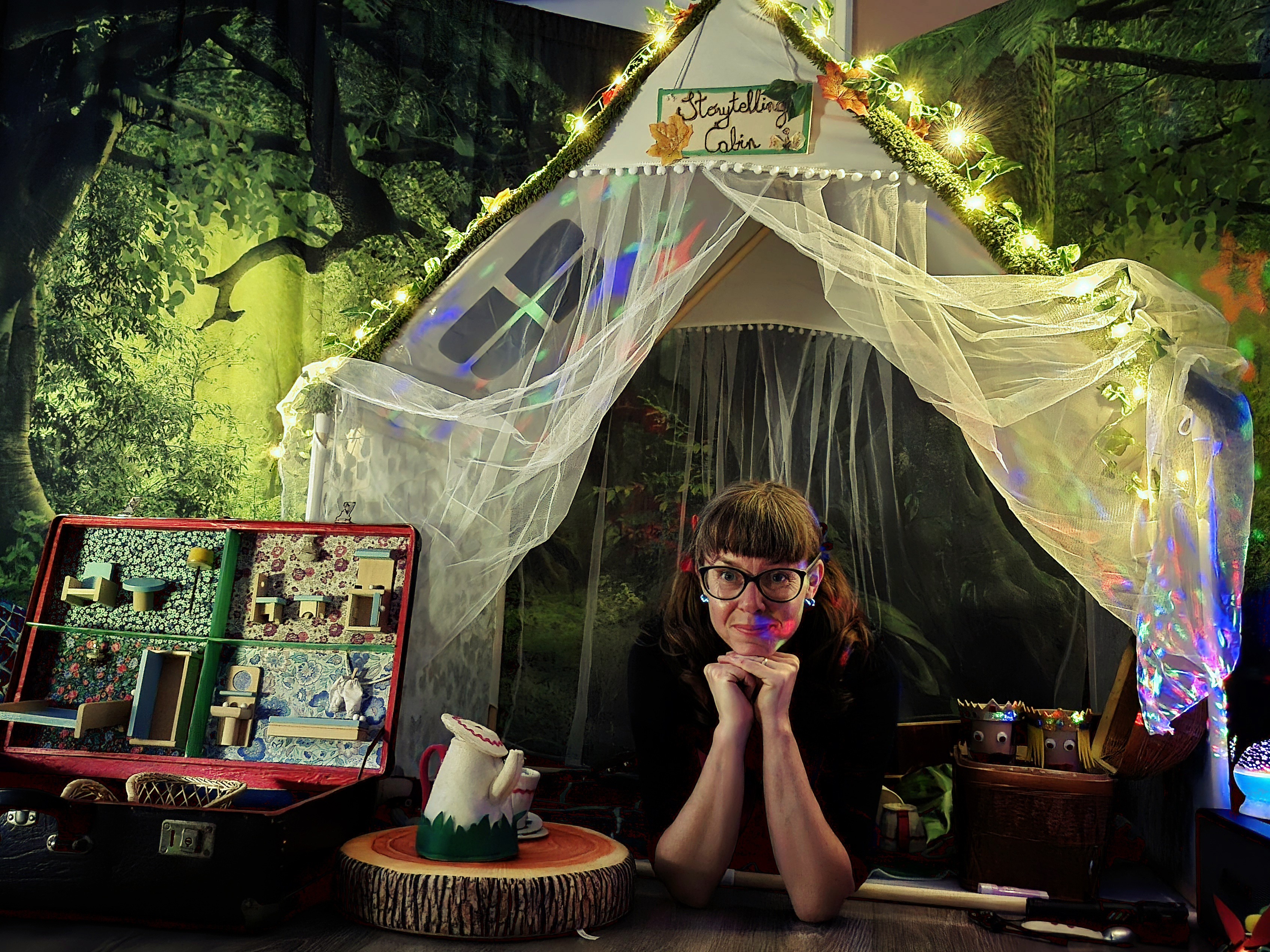 The storytelling cabin, lit with fairy lights